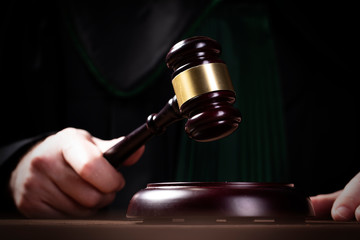 judge hits the gavel and pronunces final judgement. Law and justice concept