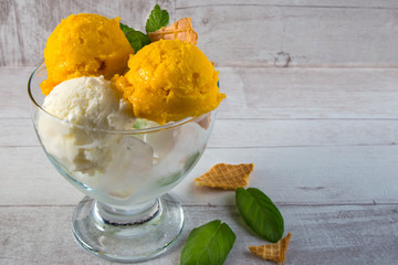 Homemade Organic Vanilla and Mango  Ice Cream with Mint - Image