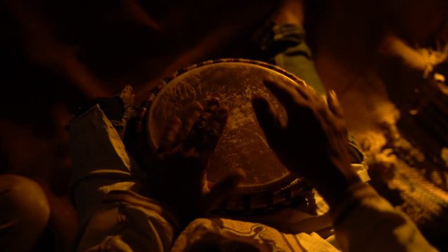 Percussionist playing bata drums in Africa