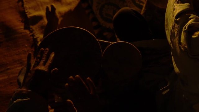 Percussionist playing bata drums in Africa