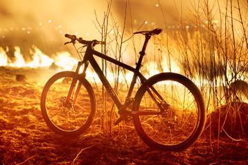 Naklejka premium bike on fire field