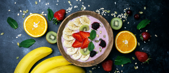 Yogurt smoothie bowl. Vegetarian healthy food (berries, yogurt, muesli, fruit)