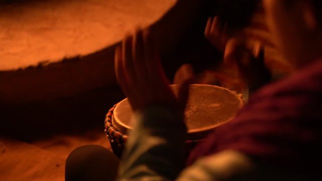 Percussionist playing bata drums in Africa