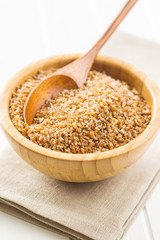Dry bulgur wheat grains.