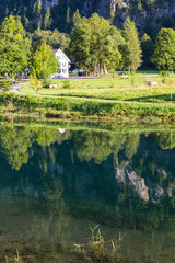 Fototapeta premium Sunny morning in the Swiss Alps. Klontalersee at summer. Switzerland