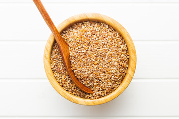 Dry bulgur wheat grains.