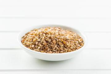 Dry bulgur wheat grains.