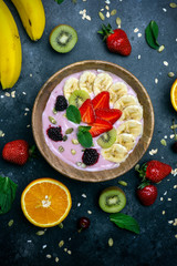 Yogurt smoothie bowl. Vegetarian healthy food (berries, yogurt, muesli, fruit)