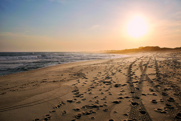 nantucket sunset with tire tracks