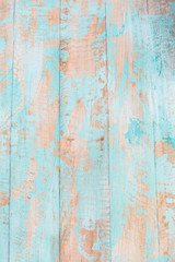 Fototapeta na wymiar Blauer Holzhintergrund mit abblätternden Farbe 