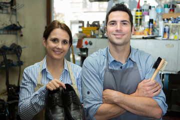 male and female cobbler posing