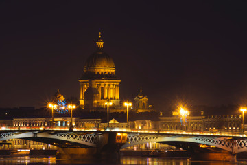 Fototapeta premium St. Petersburg, view of St. Isaac's Cathedral at night. Bridge bridges white nights