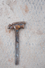 Hammer made from the remnants of reinforcement. Homemade hand tools on the construction site.