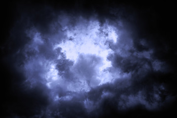 Naklejka na ściany i meble Thunder Sky. The sky is covered with gloomy rain clouds as a background.