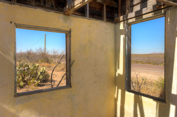 Through the broken windows of an Abandoned House.