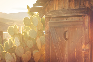 Old retro outhouse found on Route 66 in Arizona.