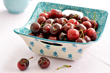 Fresh Bing cherries in square dish
