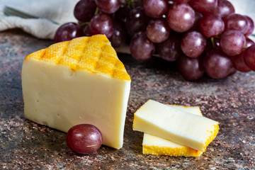 Saint Paulin creamy, mild, semi-soft French cheese made from pasteurized cow milk, originally made by Trappist monks