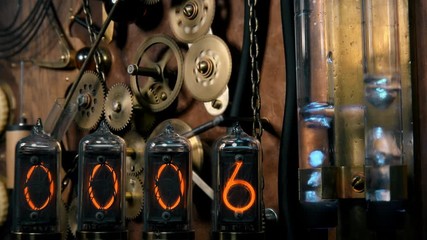 Steampunk device, counting time from 10 to 0 on discharge lamps with rotating gears and bubble bulbs, in the old style