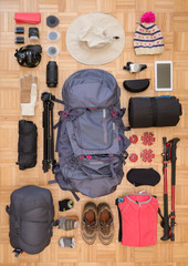 Top view and flat lay of women's camping gear and equipment