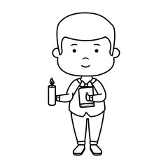 little boy with bible and candle first communion