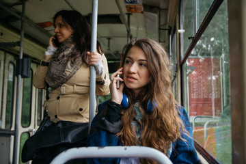 Young woman riding in public transportation