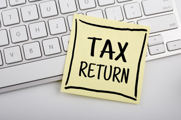 Tax Return Concept On Sticky Note