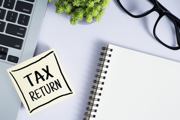 Tax Return Concept On Sticky Note