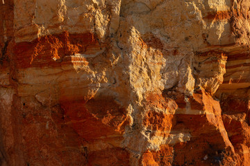 Multi-colored sandy sedimentary rock.  Places in the south of Europe.
