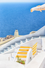 Fototapeta premium Amazing Travel Destinations. White Stairs in Oia Village in Santorini Island in Greece with Aegean Sea on Background.