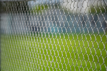 Stock image chainlink fence blurry background bokeh