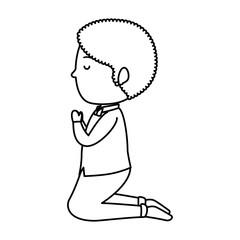 little boy kneeling first communion