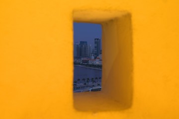 View of Luanda through Fortaleza Sao Miguel wall window