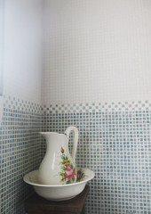 Wash bowl and pitcher in a modern bathroom