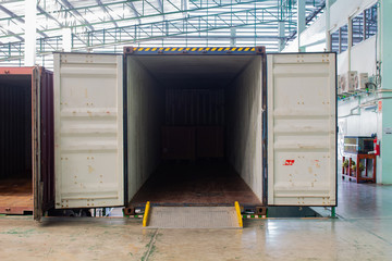 The container inside warehouse on shipment area.
