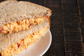 Sliced Pimento Cheese Sandwich on Wooden Table