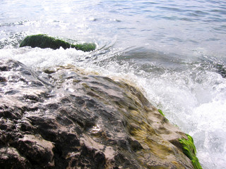 Gorgeous ocean surf to the shore waves with clear sea water with white foam