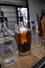 Dark and light tequila in a bottle 