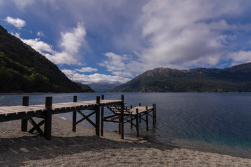 Fototapeta na wymiar Scene view of a wooden pier at Futalaufquen lake in Los Alerces National Park, Patagonia, Argentina