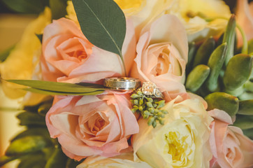 bouquet of roses with rings