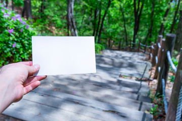 Image of a white card on a trail
