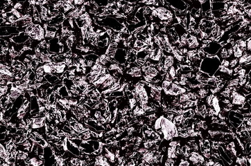  Abstract background consists of a texture of stones in black and silver color.