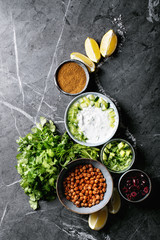 Tzatziki and chickpeas salat in ceramic bowl