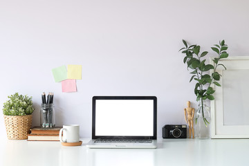 Workspace desk and laptop. copy space and blank screen. Business image, Blank screen laptop and supplies.
