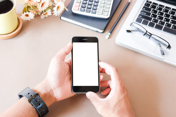 Top view office stuff with notepad, laptop and coffee cup mouse notepad shot.blank screen mobile phone and supplies on white desk workspace and copy space.