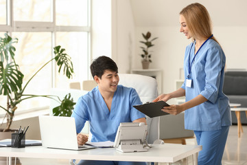 Young medical assistants working in clinic