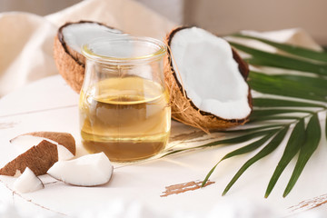 Composition with coconut oil on table