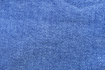 Fototapeta na wymiar Texture of jeans fabric, closeup