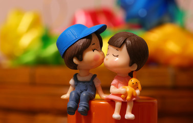 boy and girl playing with toys