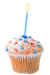 Festive cupcake with a burning candle